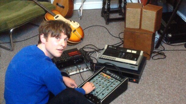 man playing a electronic keyboard